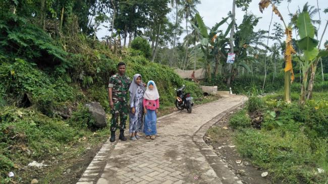 Dansatgas TMMD Ke 104 Kodim 0824 Pastikan Semua Pekerjaan Dapat Diselesaikan .