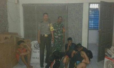 Waahhh.. Home Industri Ini Produksi Miras, 500 kotak Dus Diamankan