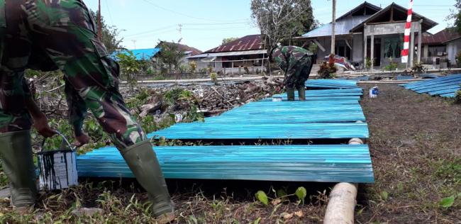 Potret Sinergitas Antara Mahasiswa, TNI-Polri dan Masyarakat di TMMD 104
