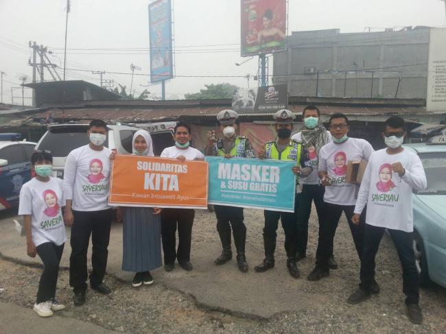 Bersama Polisi, KITA Bagikan Masker dan Susu Gratis