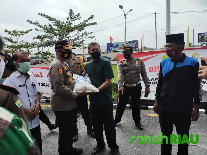 Kapolsek Ukui hadiri apel Pelepasan bansos di Mapolres Pelalawan