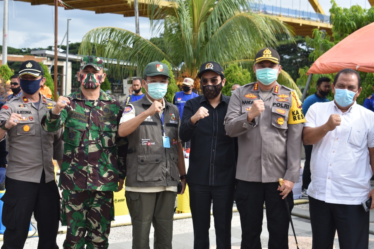 Kapolresta Pekanbaru pimpin Apel rapid test massal dan Penyemprotan Disinfektan