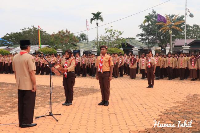Selaku Kamabicab, Bupati Pimpin Apel Gelar Senja Kwarcab 04.02 Gerakan Pramuka Kabupaten Inhil