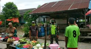 Tekan Angka Penularan Covid-19, Praka J. Aritonang Laksanakan Sosialisasi Prokes