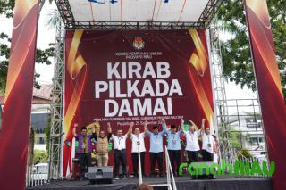 Team Cooling System beserta Brigade Polwan Ditlantas Polda Riau Sukseskan Kirab Pilkada