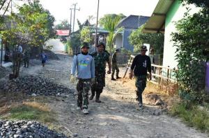 Satgas TMMD Reguler Tegal Berjalan Kaki Sambil Silaturahmi di Suradadi