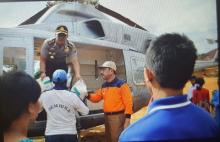 Gunakan Heli, PJ. Bupati Kampar Tinjau Langsung Korban Banjir
