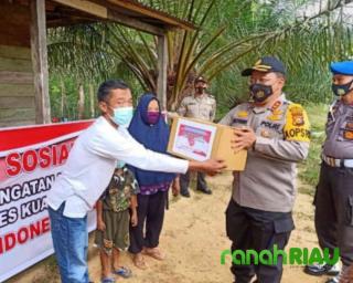 Sempena HUT RI KE - 75, Polres Kuansing Berbagi 1000 Paket Sembako Kepada Warga