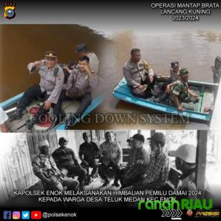 Tempuh Jalur Darat dan Sungai, Kapolsek Enok Bawa Pesan Pemilu Damai ke Masyarakat