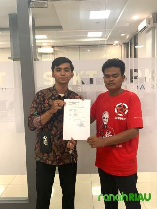 Diduga hina Presiden di Grup WA, Oknum Perguruan Swasta di Pekanbaru dilaporkan ke Kepolisian