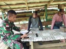 SATGAS PAMTAS YONIF 126/KC MENGAMANKAN SENJATA PISTOL DI PERBATASAN RI-PNG     